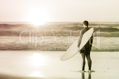 Surfer watching the waves