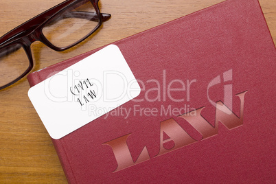 Book of laws in civil law with business card