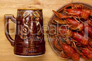 Crayfish with a mug of beer