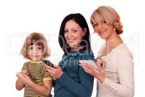 little girl  teenage girl and woman with phones and tablet pc