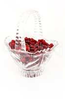 Glass basket full of dried cranberries