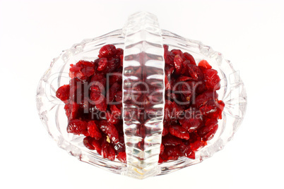 Glass basket full of dried cranberries