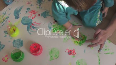 children paint finger paints