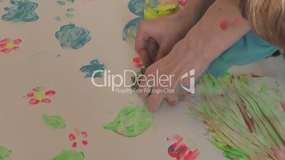 children paint finger paints