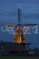 Authentic renovated windmill with Christmas star