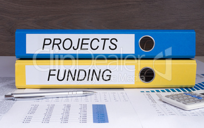 Projects and Funding binders in the office