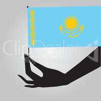 Hand with Kazakhstan flag