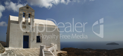 Traditional church in Greece with a bell. panorama