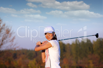 beautiful girl play golf