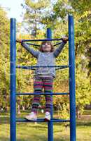 happy little girl on playground