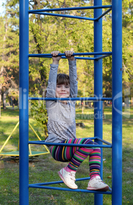 little girl on playground