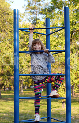 happy little girl fun on playground