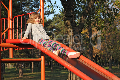 little girl on playground little girl on playground