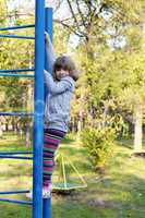 little girl on park playground