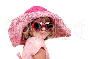 little girl with hat and sunglasses portrait
