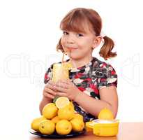 little girl drink lemonade