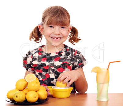 little girl make lemonade