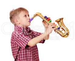 boy play saxophone