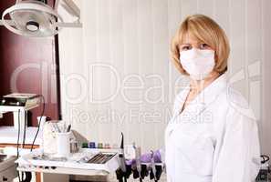 female dentist with mask