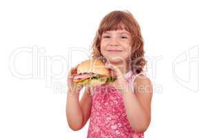 happy little girl with big sandwich