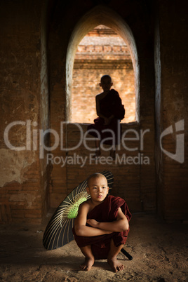Buddhist novice monks inside temple