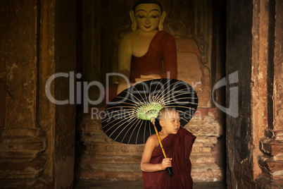 Buddhist novice monk inside monastery