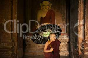 Buddhist novice monk inside monastery