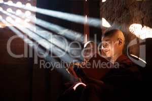 Young Buddhist novice monks reading