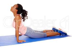 Beautiful African American woman stretching.