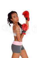 Boxer woman during boxing exercise.