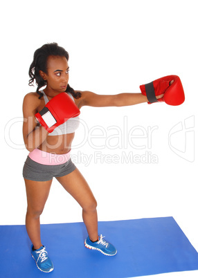 Boxing woman during exercise.