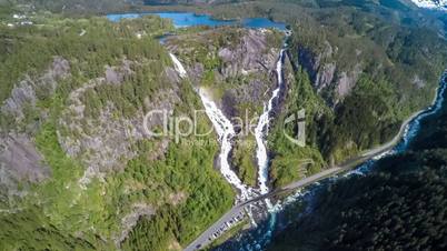 Aerial footage Latefossen Waterfall Odda Norway. Latefoss is a powerful, twin waterfall. View from the bird's-eye view.