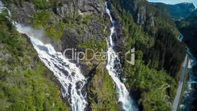 Aerial footage Latefossen Waterfall Odda Norway. Latefoss is a powerful, twin waterfall. View from the bird's-eye view.