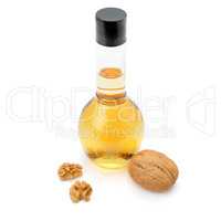 fruit and walnut oil isolated on a white background
