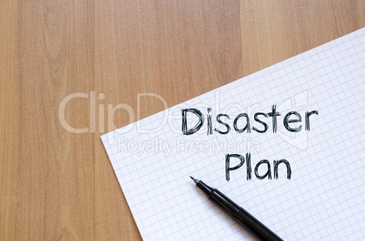 Disaster plan write on notebook