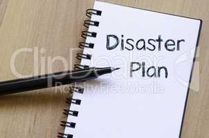 Disaster plan write on notebook