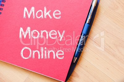 Make money online write on notebook