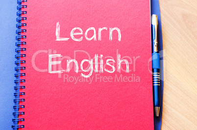 Learn english write on notebook