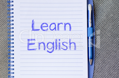 Learn english write on notebook