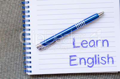 Learn english write on notebook