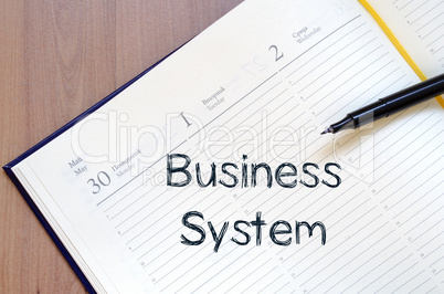 Business system write on notebook