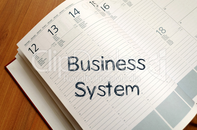 Business system write on notebook