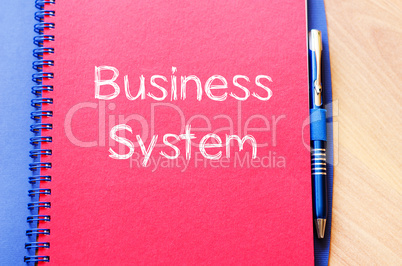 Business system write on notebook