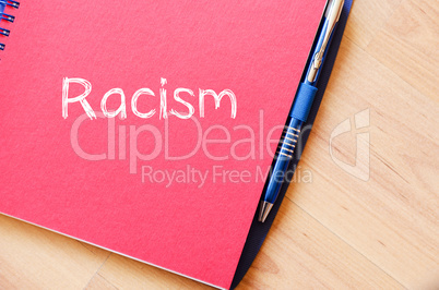 Racism write on notebook