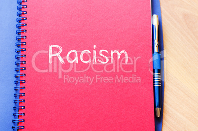 Racism write on notebook