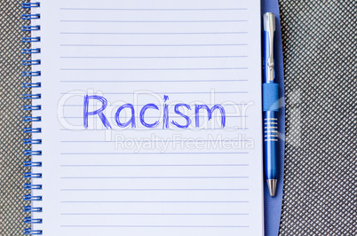 Racism write on notebook
