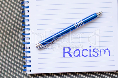 Racism write on notebook