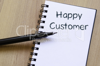 Happy customer write on notebook
