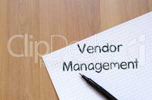 Vendor management write on notebook