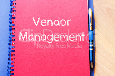 Vendor management write on notebook